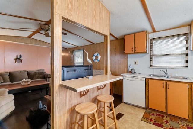 14 Scarlets Way, Bronston, KY 42518 - kitchen featuring dishwasher, light countertops, a sink, a kitchen breakfast bar, and wooden walls