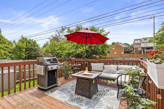 3648 Cottage Cir, Lexington, KY 40513 - wooden deck with area for grilling, a fenced backyard, and an outdoor living space with a fire pit