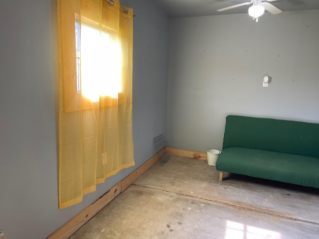 600 S 38th St, Middlesboro, KY 40965 - living area with a ceiling fan and unfinished concrete flooring