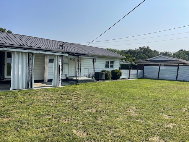 600 S 38th St, Middlesboro, KY 40965 - back of house featuring metal roof and central air condition unit