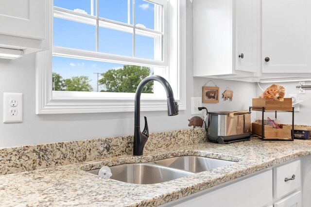 116 Hackberry Ct, Frankfort, KY 40601 - kitchen featuring a sink, white cabinetry, and light stone countertops