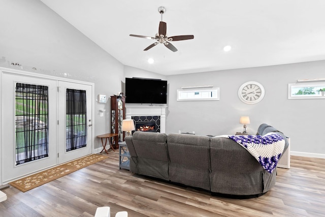 116 Hackberry Ct, Frankfort, KY 40601 - living area featuring plenty of natural light, vaulted ceiling, wood finished floors, baseboards, and a high end fireplace