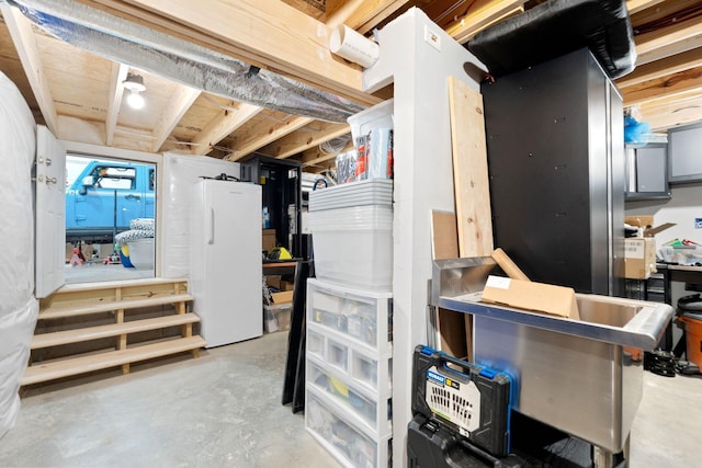 116 Hackberry Ct, Frankfort, KY 40601 - unfinished basement featuring freestanding refrigerator