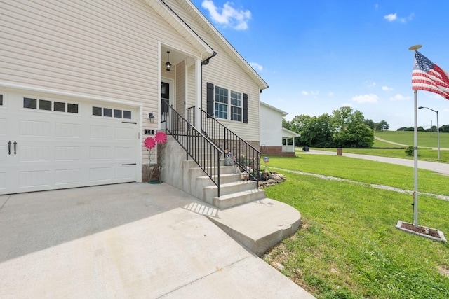 116 Hackberry Ct, Frankfort, KY 40601 - property entrance with a garage, driveway, and a yard