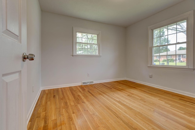 1818 Marlboro Dr, Lexington, KY 40505 - unfurnished room with healthy amount of natural light, light wood-style floors, and baseboards