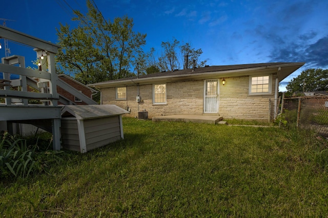 1818 Marlboro Dr, Lexington, KY 40505 - rear view of property with brick siding and cooling unit