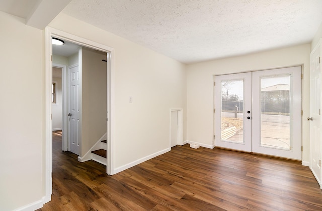 2837 Yellowstone Pkwy, Lexington, KY 40517 - unfurnished room with french doors, wood finished floors, a textured ceiling, and baseboards