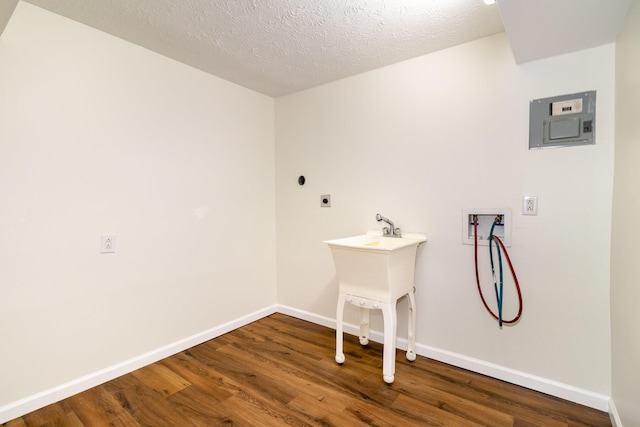 2837 Yellowstone Pkwy, Lexington, KY 40517 - laundry room featuring hookup for a washing machine, hookup for an electric dryer, wood finished floors, electric panel, and baseboards