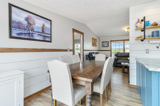 460 Keller Ln, Science Hill, KY 42553 - dining area featuring light wood-style floors, a wainscoted wall, and vaulted ceiling