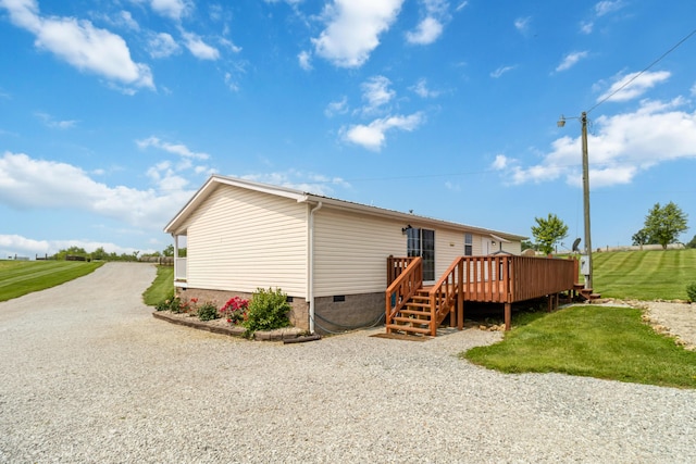 460 Keller Ln, Science Hill, KY 42553 - rear view of property with crawl space, a deck, and a lawn