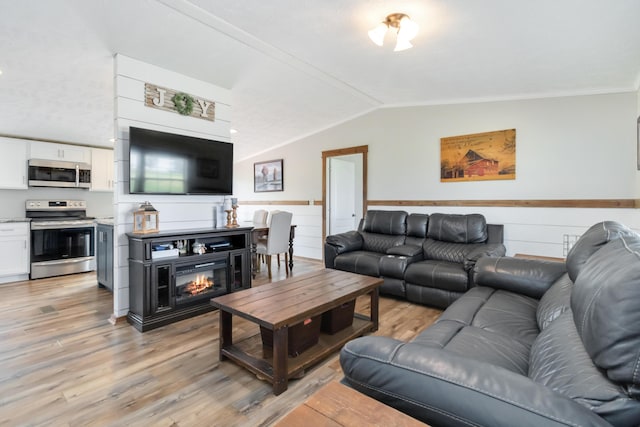 460 Keller Ln, Science Hill, KY 42553 - living room with lofted ceiling, light wood-type flooring, a wainscoted wall, and ornamental molding