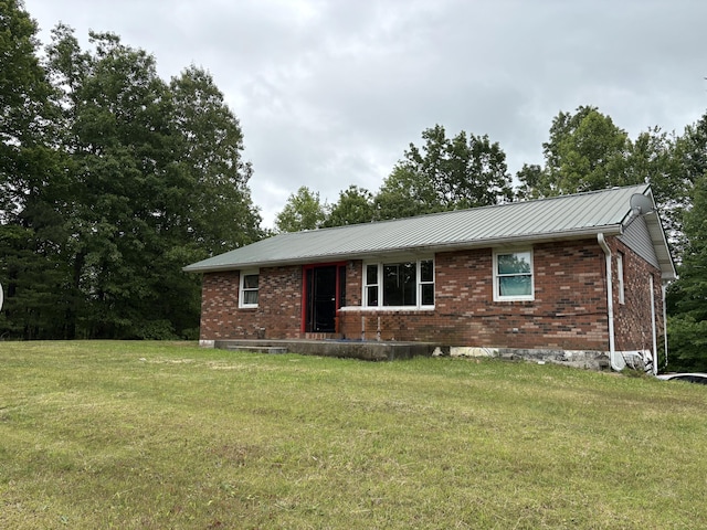 2671 Ky 1036, Zachariah, KY 41301 - ranch-style home featuring a front lawn, brick siding, and metal roof