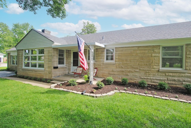 937 Mason Headley Rd, Lexington, KY 40504 - single story home with stone siding, a front lawn, and a chimney