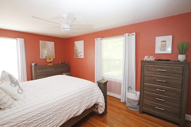 937 Mason Headley Rd, Lexington, KY 40504 - bedroom with wood finished floors, ceiling fan, and baseboards