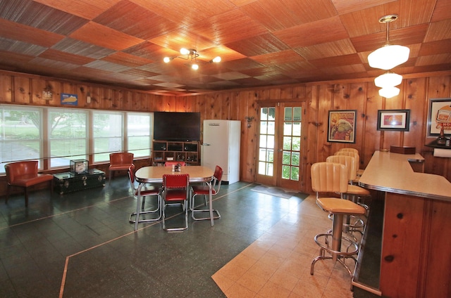 937 Mason Headley Rd, Lexington, KY 40504 - dining room featuring wood walls and dark flooring