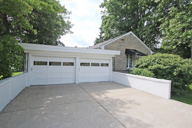 937 Mason Headley Rd, Lexington, KY 40504 - view of front of house with stone siding and a garage
