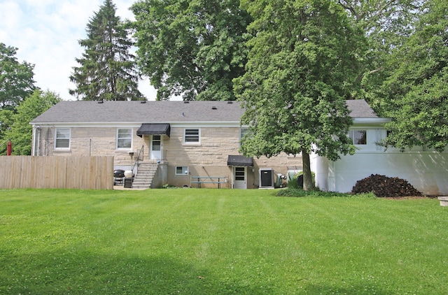 937 Mason Headley Rd, Lexington, KY 40504 - back of house with stone siding and roof with shingles