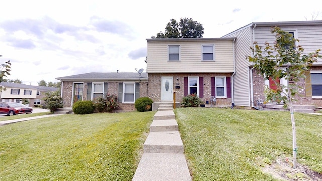 281 Osage Ct, Lexington, KY 40509 - view of front of property with brick siding and a front yard