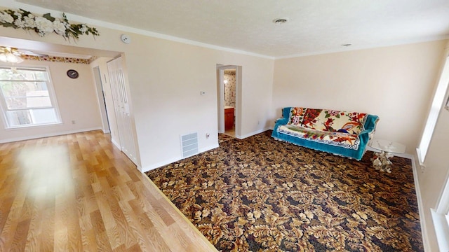 281 Osage Ct, Lexington, KY 40509 - unfurnished room featuring wood finished floors, baseboards, and crown molding