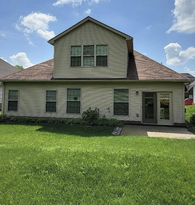 133 W Mcintosh Park, Georgetown, KY 40324 - rear view of property featuring a patio area, a yard, and a shingled roof