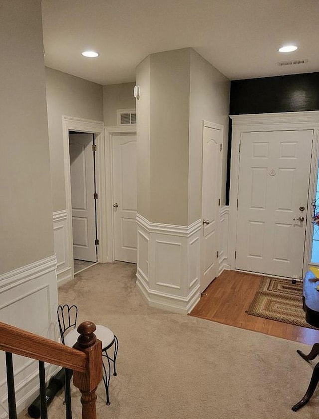 133 W Mcintosh Park, Georgetown, KY 40324 - foyer with light colored carpet, a wainscoted wall, and recessed lighting