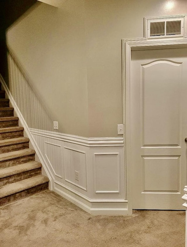 133 Mcintosh Park, Georgetown, KY 40324 - staircase with carpet floors, a decorative wall, and a wainscoted wall