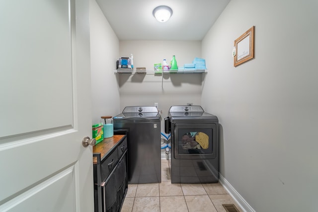 140 Central Park Ave, Berea, KY 40403 - washroom featuring washer and clothes dryer, light tile patterned floors, and baseboards