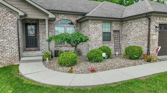 140 Central Park Ave, Berea, KY 40403 - entrance to property featuring a garage, roof with shingles, and brick siding