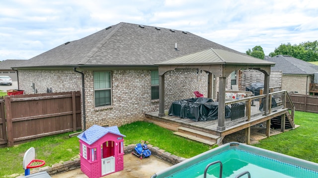 140 Central Park Ave, Berea, KY 40403 - rear view of property with a deck, a shingled roof, brick siding, and a gazebo