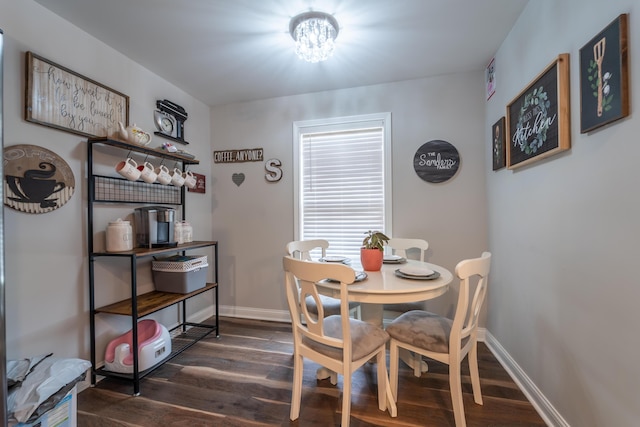 140 Central Park Ave, Berea, KY 40403 - dining area featuring dark wood-style flooring, baseboards, and a chandelier