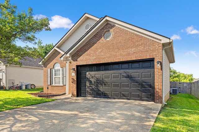 106 Byakoa Ln, Georgetown, KY 40324 - view of front facade featuring brick siding, a garage, concrete driveway, and cooling unit