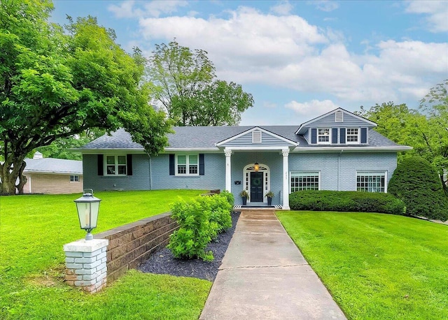 235 Westover Rd, Frankfort, KY 40601 - view of front of property featuring a front yard, brick siding, and roof with shingles