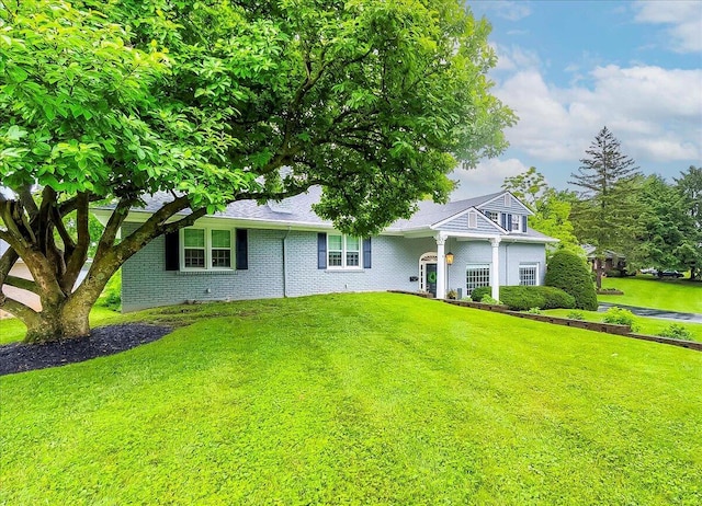 235 Westover Rd, Frankfort, KY 40601 - view of front of home featuring a front lawn and brick siding