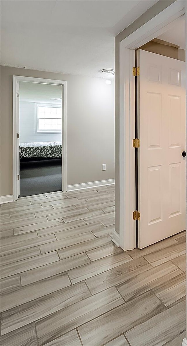 235 Westover Rd, Frankfort, KY 40601 - hall with baseboards and light wood-type flooring