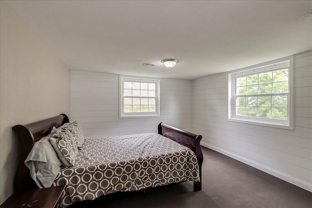 235 Westover Rd, Frankfort, KY 40601 - carpeted bedroom with multiple windows and wood walls