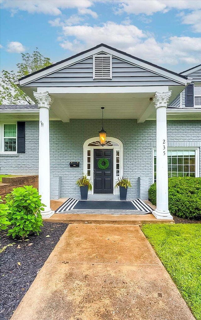 235 Westover Rd, Frankfort, KY 40601 - entrance to property featuring covered porch and brick siding