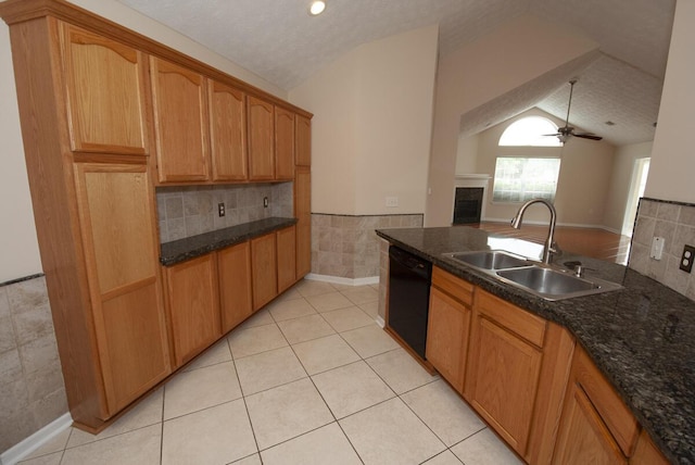 102 Academy Dr, Wilmore, KY 40390 - kitchen with black dishwasher, a sink, vaulted ceiling, light tile patterned floors, and a textured ceiling