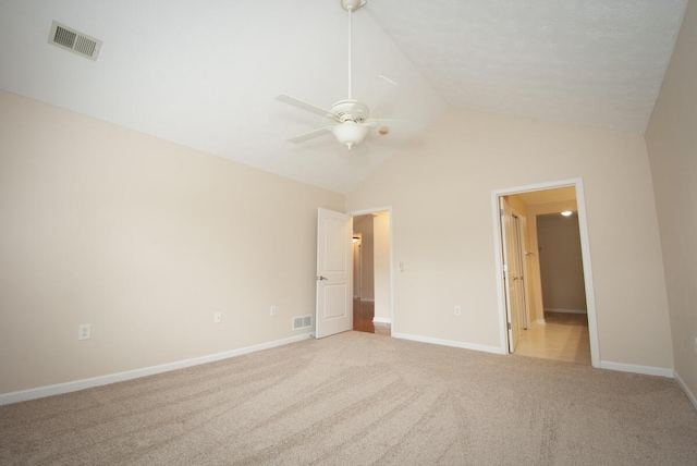 102 Academy Dr, Wilmore, KY 40390 - unfurnished bedroom featuring lofted ceiling, light carpet, baseboards, and a ceiling fan