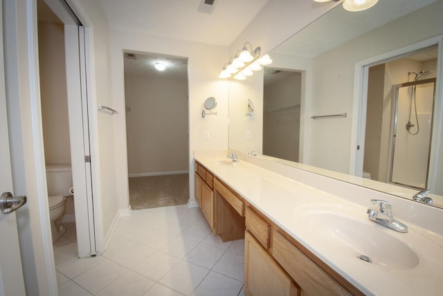 102 Academy Dr, Wilmore, KY 40390 - bathroom featuring toilet, double vanity, tile patterned floors, a shower stall, and baseboards