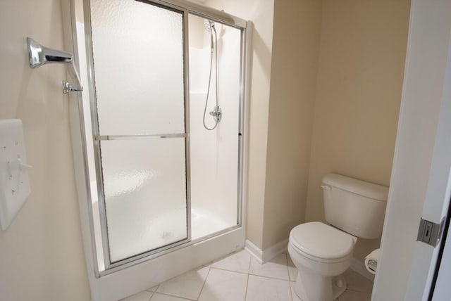 102 Academy Dr, Wilmore, KY 40390 - bathroom with a shower stall, toilet, tile patterned floors, and baseboards