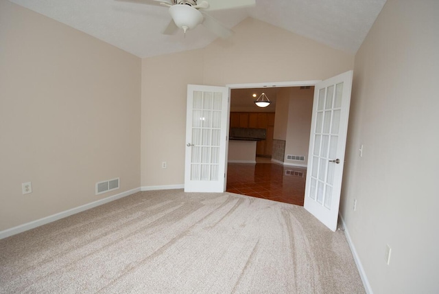 102 Academy Dr, Wilmore, KY 40390 - unfurnished room featuring french doors, carpet floors, a ceiling fan, vaulted ceiling, and baseboards