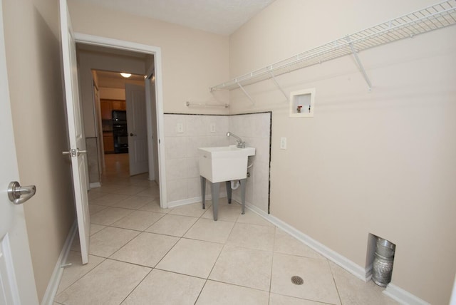 102 Academy Dr, Wilmore, KY 40390 - laundry room with hookup for a washing machine and light tile patterned flooring