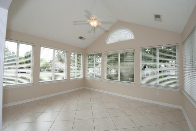 102 Academy Dr, Wilmore, KY 40390 - unfurnished sunroom with lofted ceiling, plenty of natural light, baseboards, and tile patterned flooring