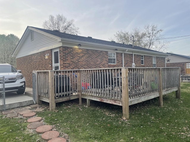 310 Yorktown Dr, Paris, KY 40361 - rear view of house with brick siding, a wooden deck, and a yard