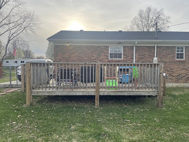 310 Yorktown Dr, Paris, KY 40361 - rear view of house with brick siding, a deck, and a yard