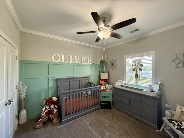 627 Fourwinds Dr, Richmond, KY 40475 - carpeted bedroom with crown molding, a nursery area, ceiling fan, and a decorative wall