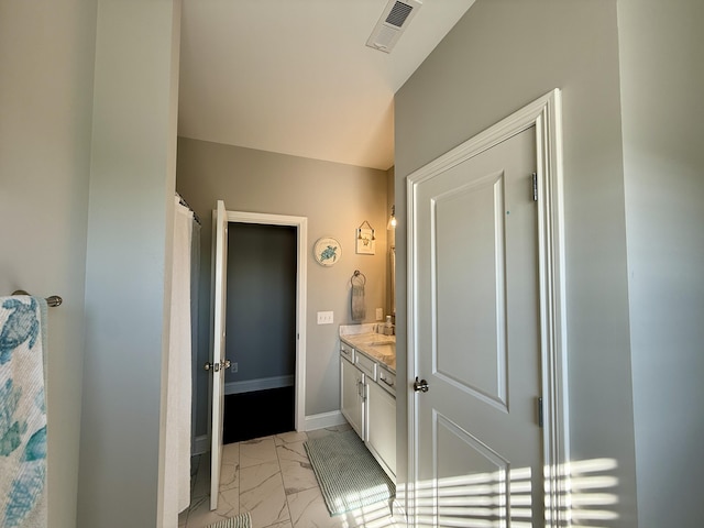 627 Fourwinds Dr, Richmond, KY 40475 - full bathroom with marble look tile flooring, vanity, and baseboards