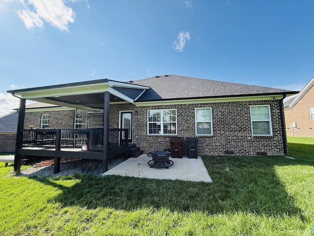 627 Fourwinds Dr, Richmond, KY 40475 - back of property featuring a patio area, a deck, a lawn, brick siding, and a shingled roof