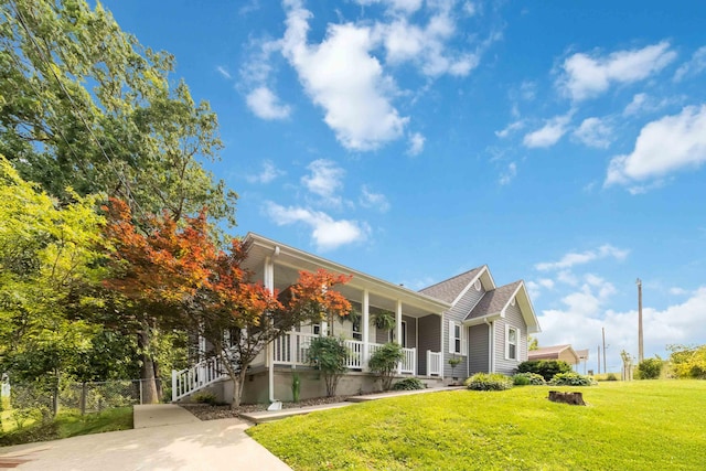 913 W 8th St, Corbin, KY 40701 - view of front of property featuring covered porch and a front yard