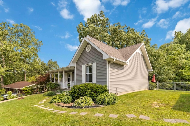 913 W 8th St, Corbin, KY 40701 - view of side of home with a porch and a shingled roof